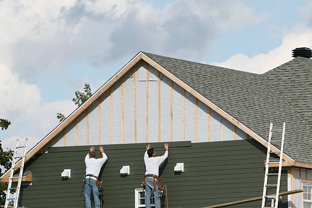 Professional Siding Contractor technician working in Parkville, PA